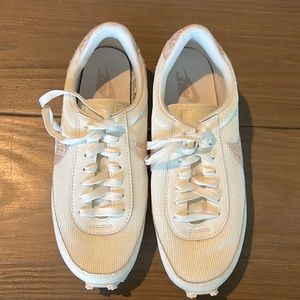 Cream Nike shoes